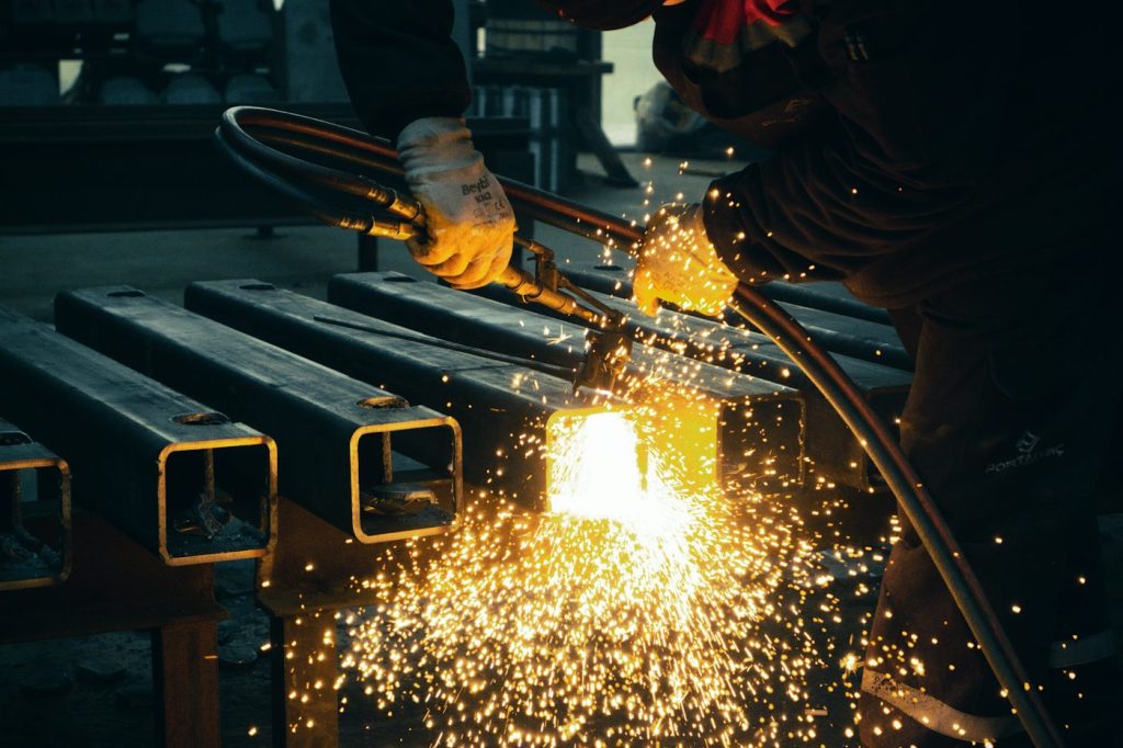 Sparks flying off steel sections being cut